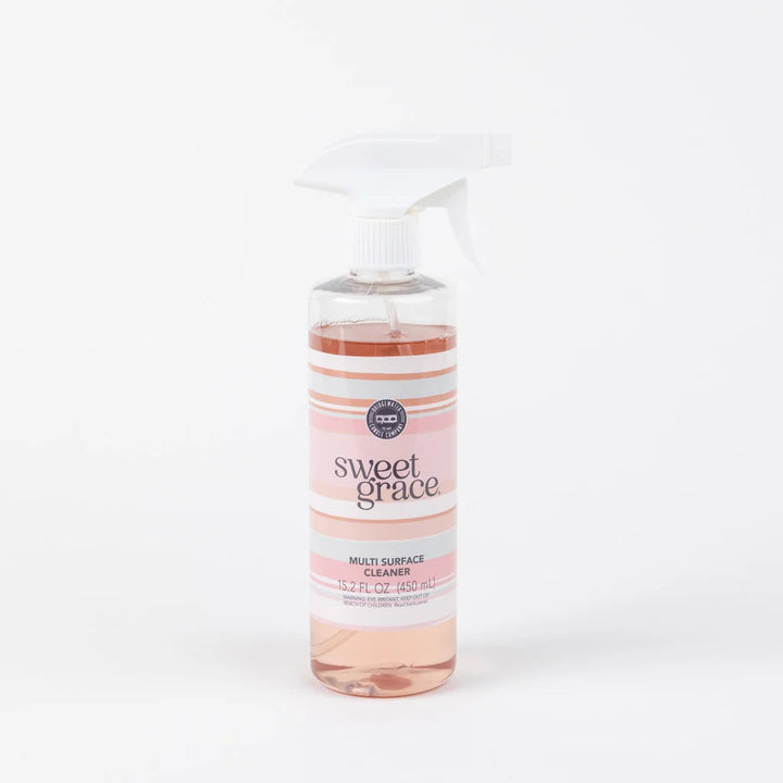 15.2 fl oz Sweet Grace Multi-Surface Cleaner in a clear plastic spray bottle with a pink and white striped label.