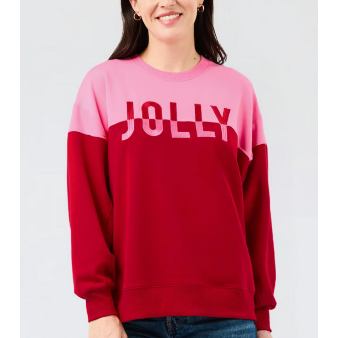 Sarah Jolly Sweatshirt, color-blocked pink and red crewneck with “JOLLY” chest print. Sizes available.
