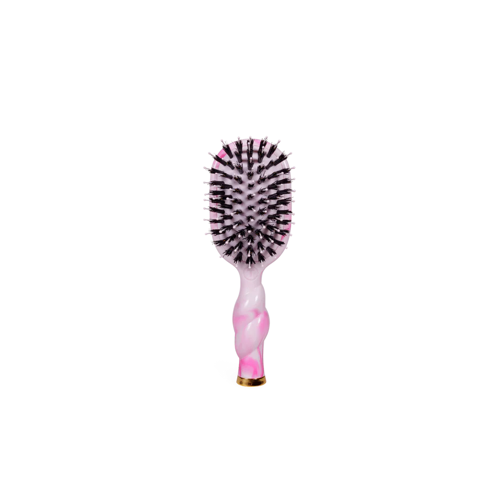 Pink and white oval boar bristle hair brush with twisted handle for frizz control. Available in standard and travel sizes.