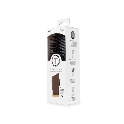 White TELETIES box with Mini Boar Brush | Tortoise, black bristles visible. Mini size. For all hair types, travel-friendly.