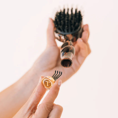 Mini Boar Brush | Tortoise, round travel hair brush with removable end cap and attached black cleaning bristles. Available in mini size.