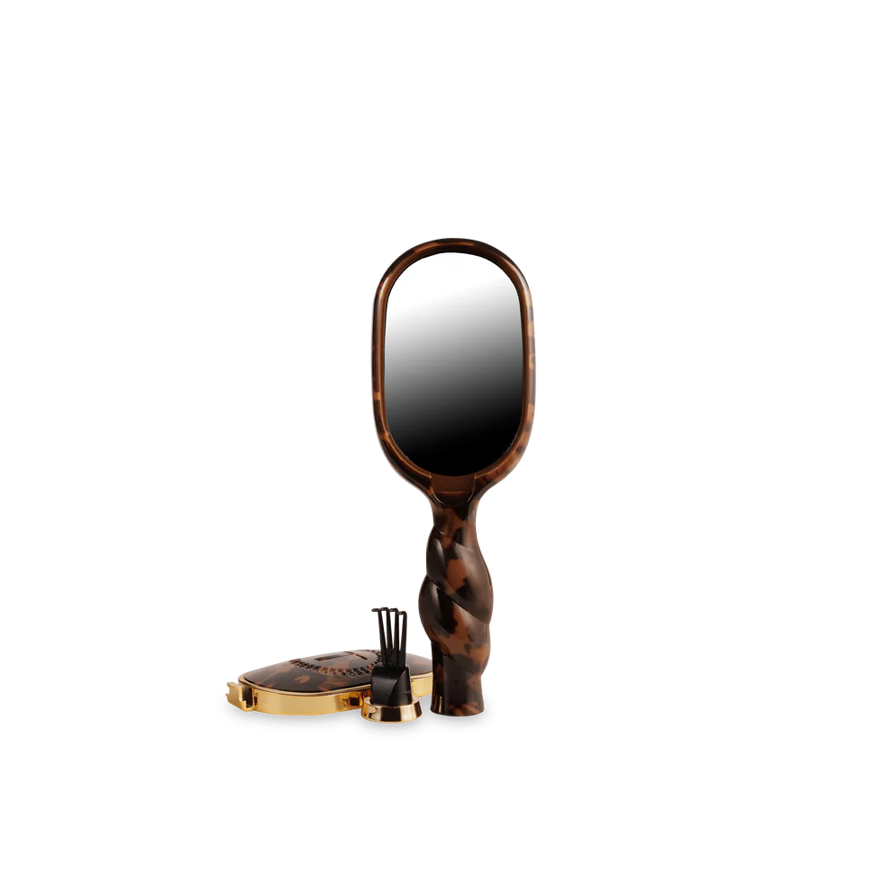 Mini Boar Brush | Tortoise, available in mini size, with tortoiseshell pattern handle and dense bristles.