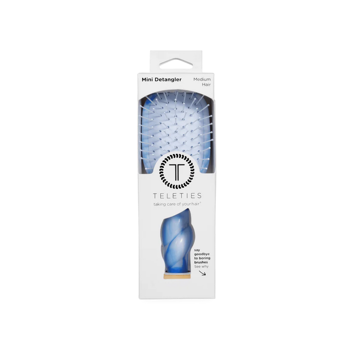Mini Detangler Brush for Medium Hair in light blue with white bristles, comes in a white Teleties box. Size: Mini.