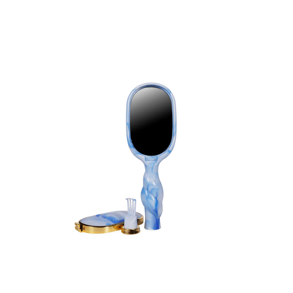 Blue Mini Detangler Brush for Medium Hair by Tide &amp; True. Available in mini size.