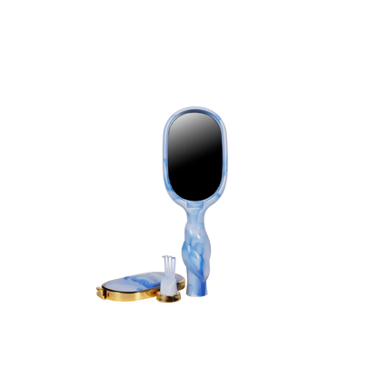 Blue Mini Detangler Brush for Medium Hair by Tide & True. Available in mini size.