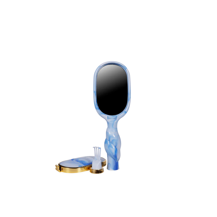 Blue Mini Detangler Brush for Medium Hair by Tide &amp; True. Available in mini size.