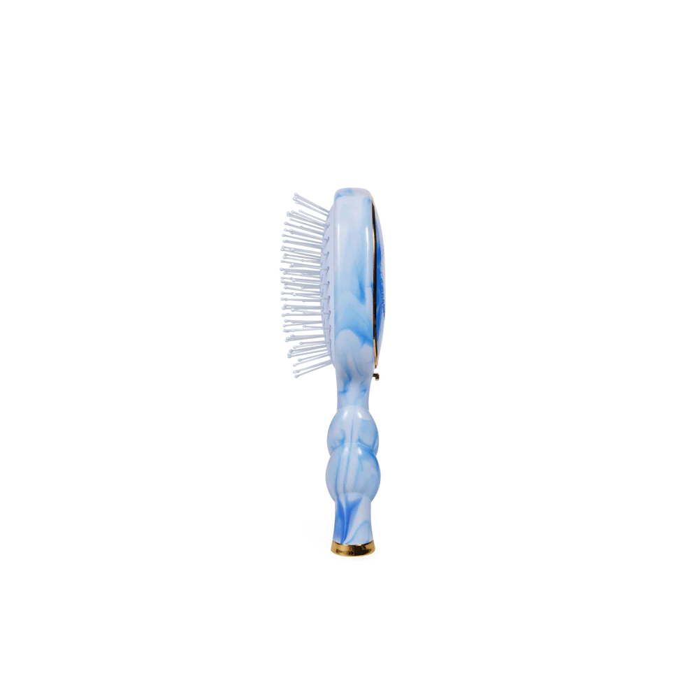 Mini Detangler Brush for Medium Hair in blue and white marble; plastic bristles; available in mini size.
