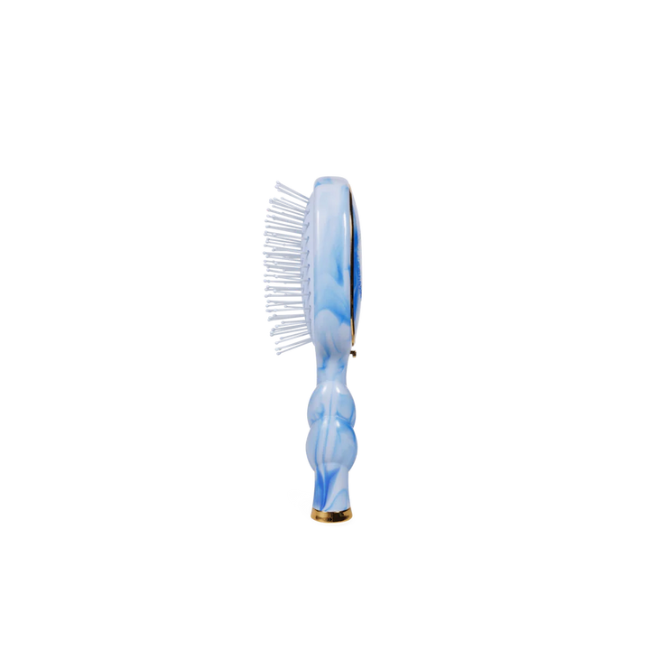 Mini Detangler Brush for Medium Hair in blue and white marble; plastic bristles; available in mini size.