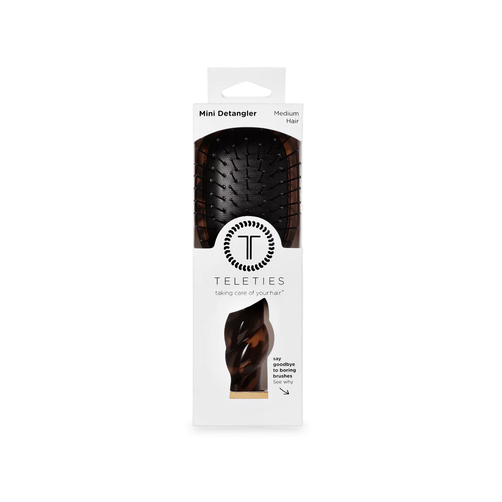 Mini Detangler Brush for Medium Hair | Tortoise, travel size, black base, brown accents, in clear-window white packaging.