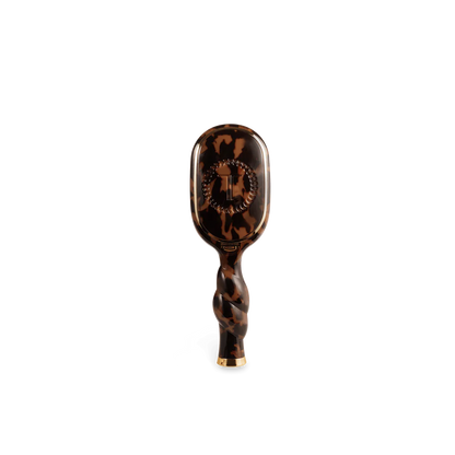 Mini Detangler Brush for Medium Hair | Tortoise with twisted handle, gold accents, tortoiseshell design; available in mini size.