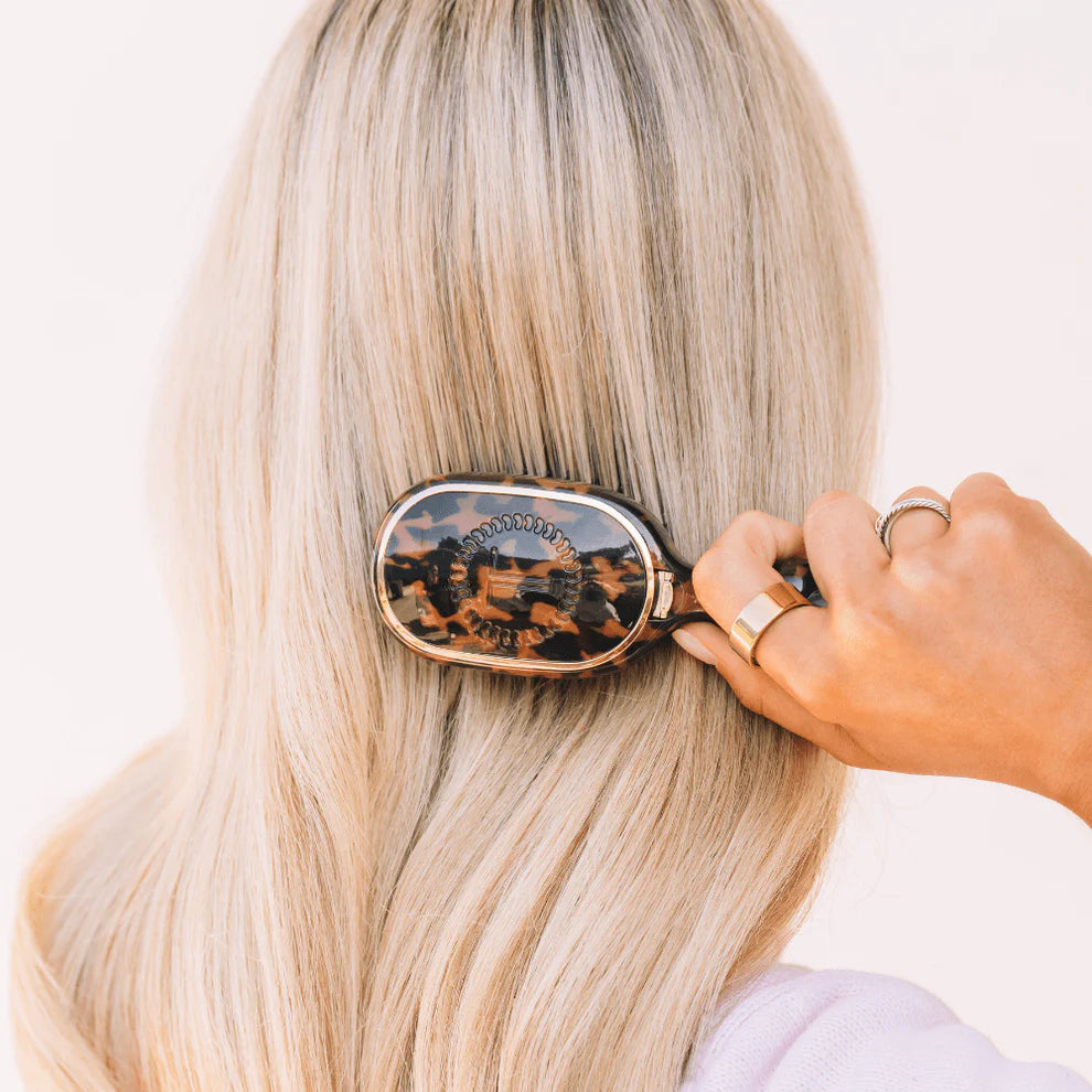 Mini Detangler Brush for Medium Hair | Tortoise, compact size, available in mini; ideal for travel and gentle detangling.