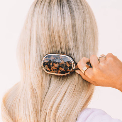 Mini Detangler Brush for Medium Hair | Tortoise, compact size, available in mini; ideal for travel and gentle detangling.