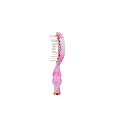 The Pinch Me! Tie Dye Pink Vented Hair Brush has wide-set bristles, a glossy pink and gold curved handle. Sizes available.
