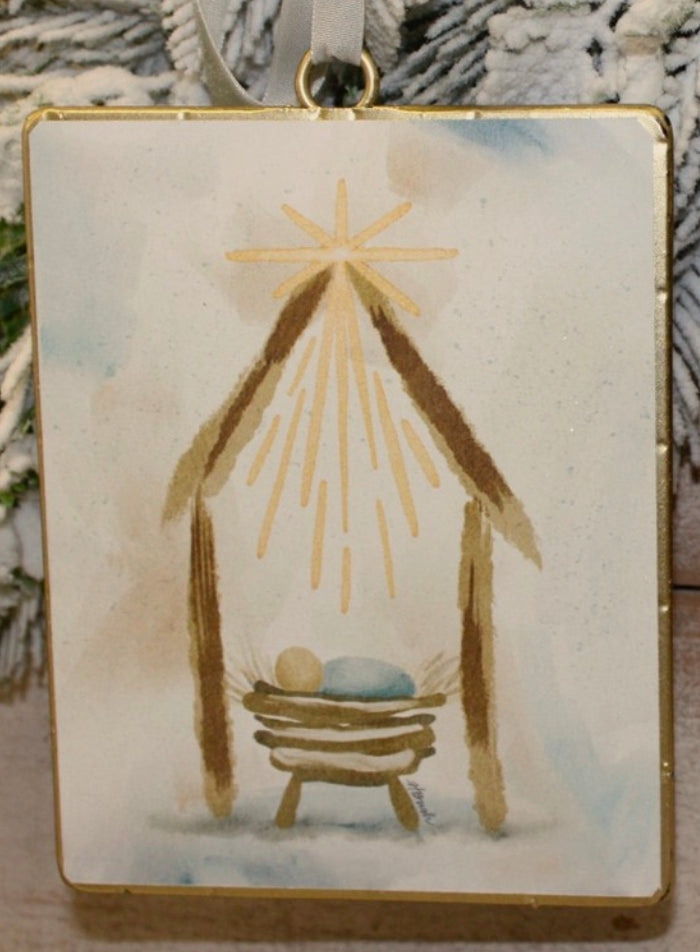 Rectangular Glittered Baby Jesus in the Manger Ornament in 2 styles, featuring a painted manger scene with a baby in a crib under a shining star.