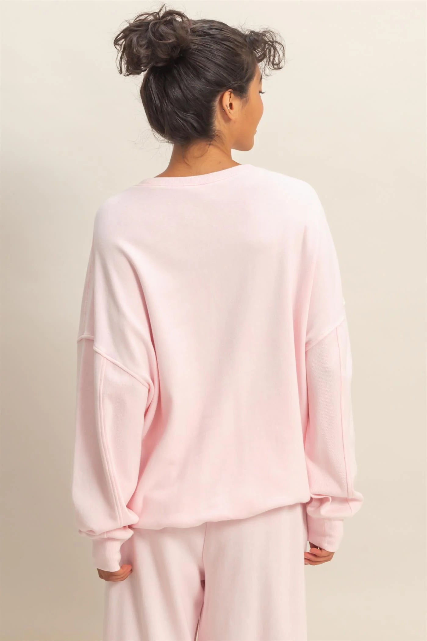 Soft Pink Acid Wash Oversized Sweatshirt. Available in sizes XS–XL.