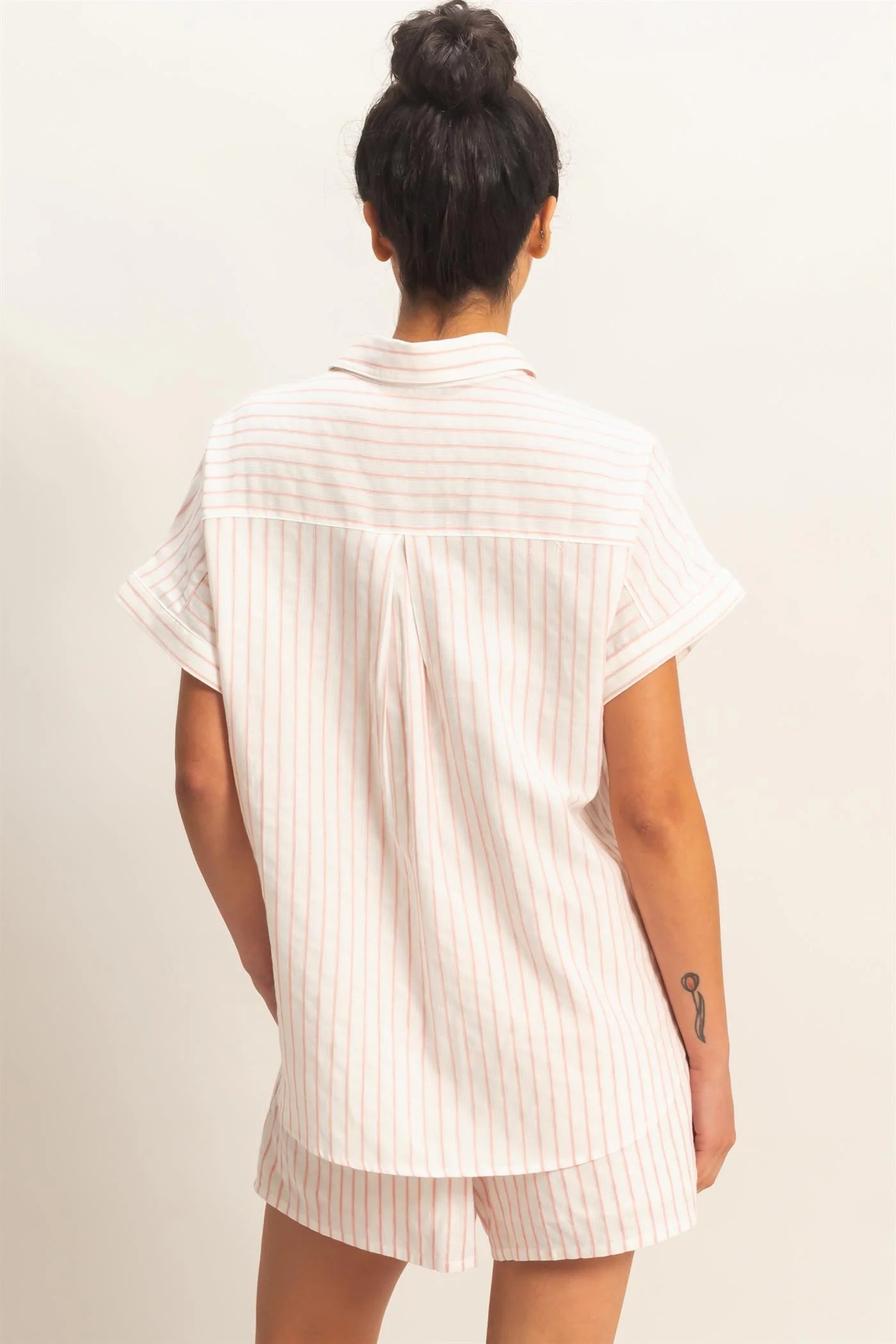 Striped Button-Up Dolman Sleeve Shirt with pale vertical stripes. Available in sizes XS–XL.
