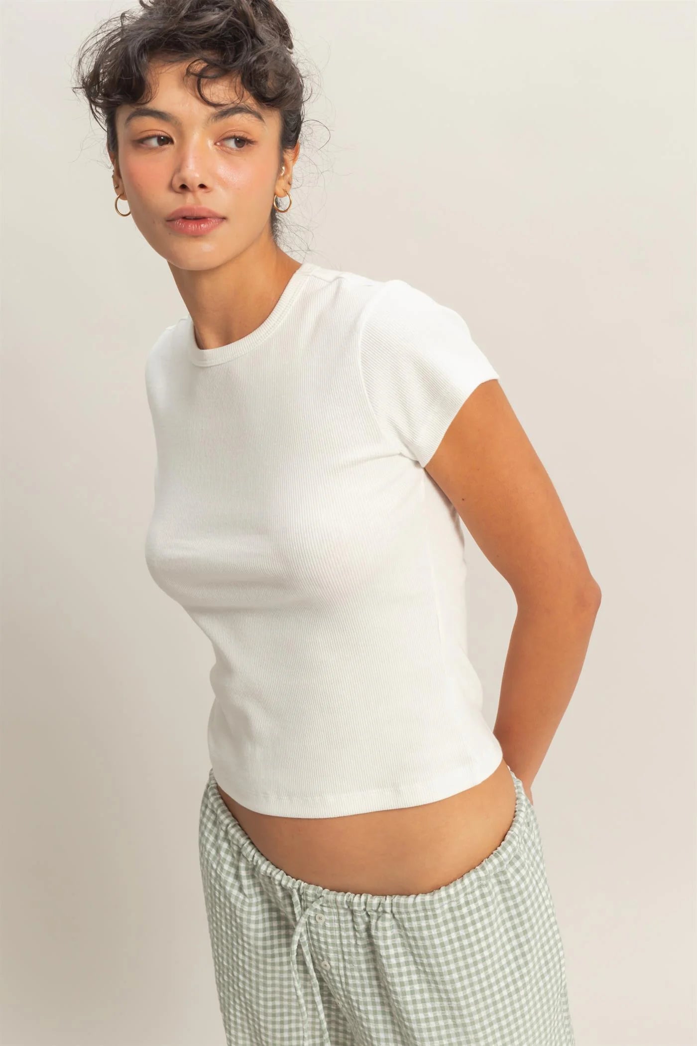Basic Ribbed Short Sleeve Top in white, fitted style. Available in sizes XS-XL.