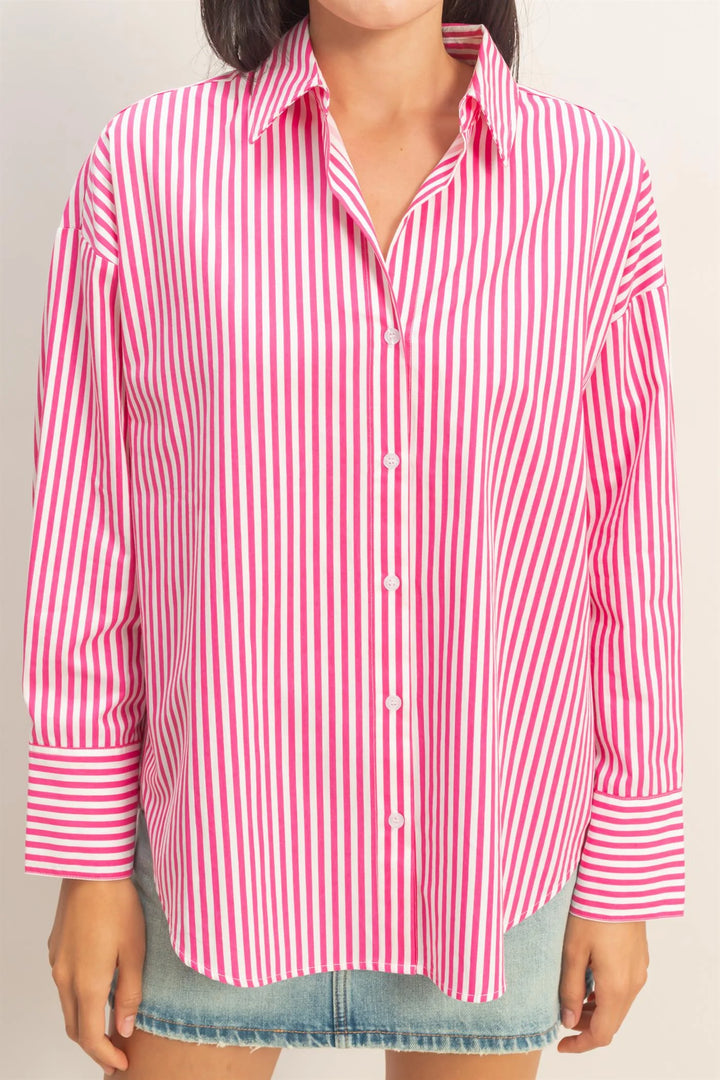 Striped Button-Up Poplin Shirt in vertical pink and white, with collar and wide cuffs. Available in sizes XS–XL.