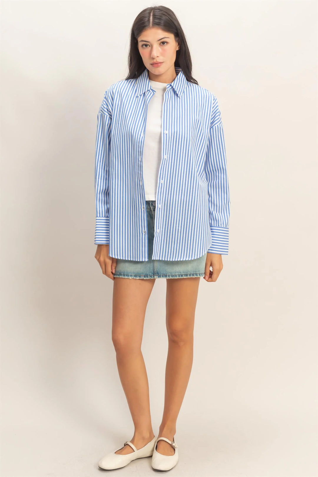 Blue and white striped button-up poplin shirt. Available in sizes XS-XL.