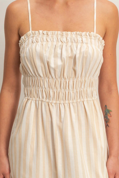Taupe Striped Spaghetti Strap Midi Dress with sleeveless A-line silhouette, ruched elastic bodice; sizes XS-XL available.
