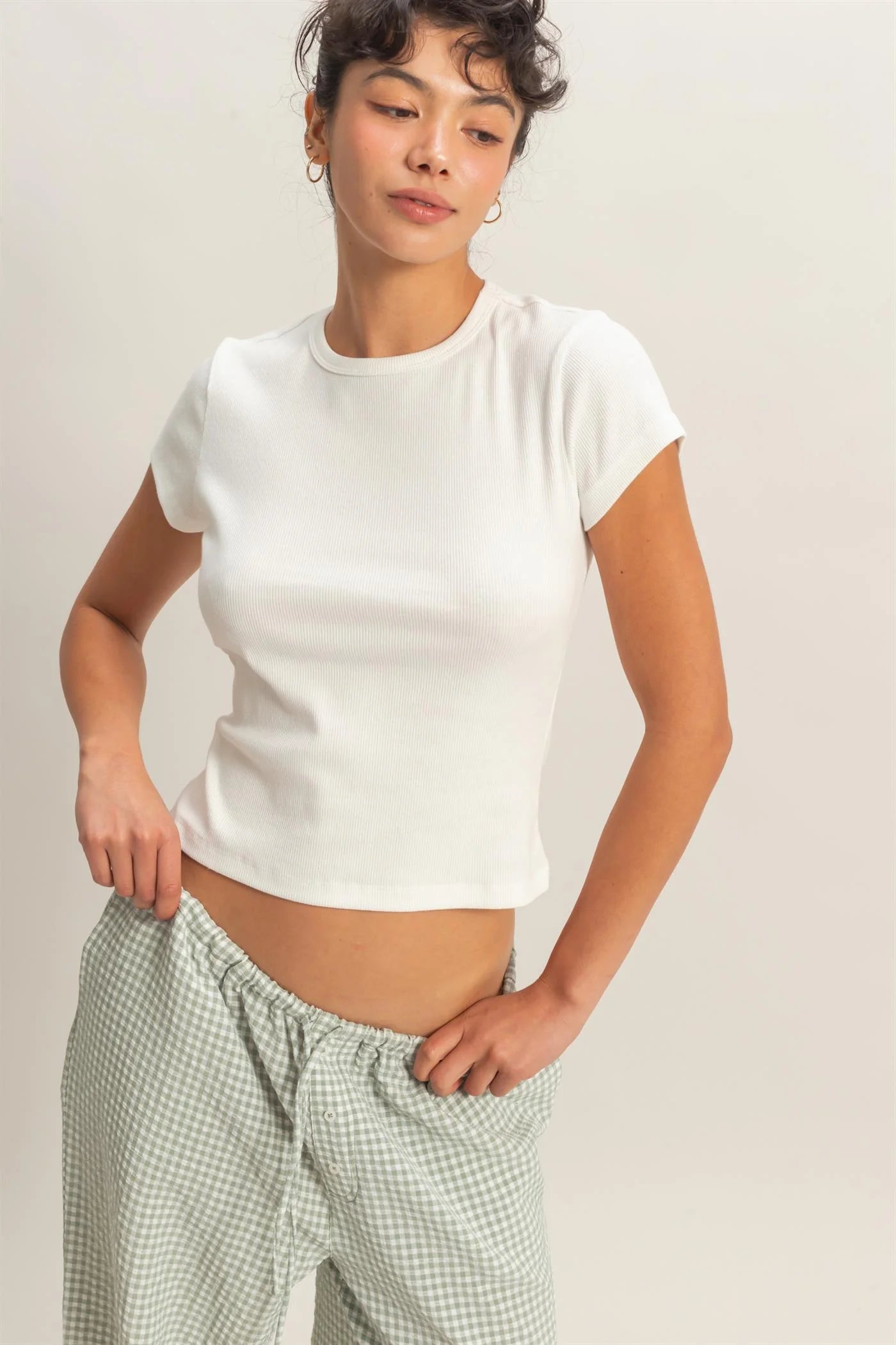 Basic Ribbed Short Sleeve Top shown; features ribbed texture, short sleeves. Available in sizes XS-XL.