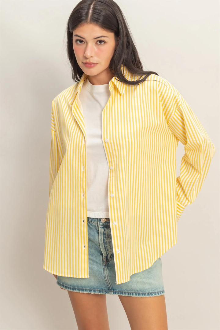 Striped Button-Up Poplin Shirt with vertical stripes and oversized fit. Available in sizes XS-XL.
