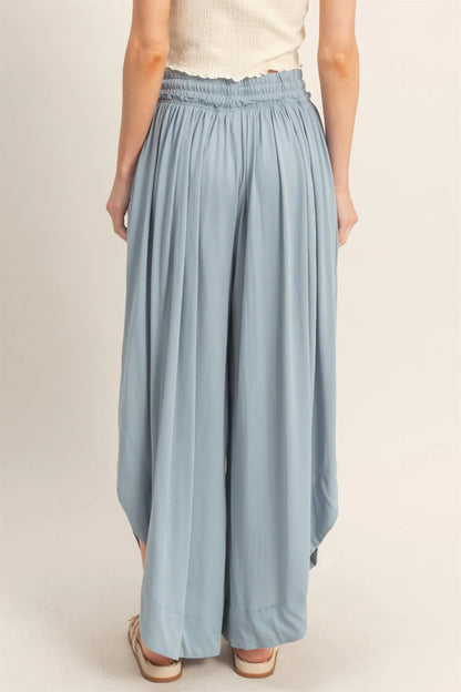 Tulip Hem Wide-Leg Pants in light blue; flowy knit, elastic waistband, soft drape. Available in 3 colors and multiple sizes.