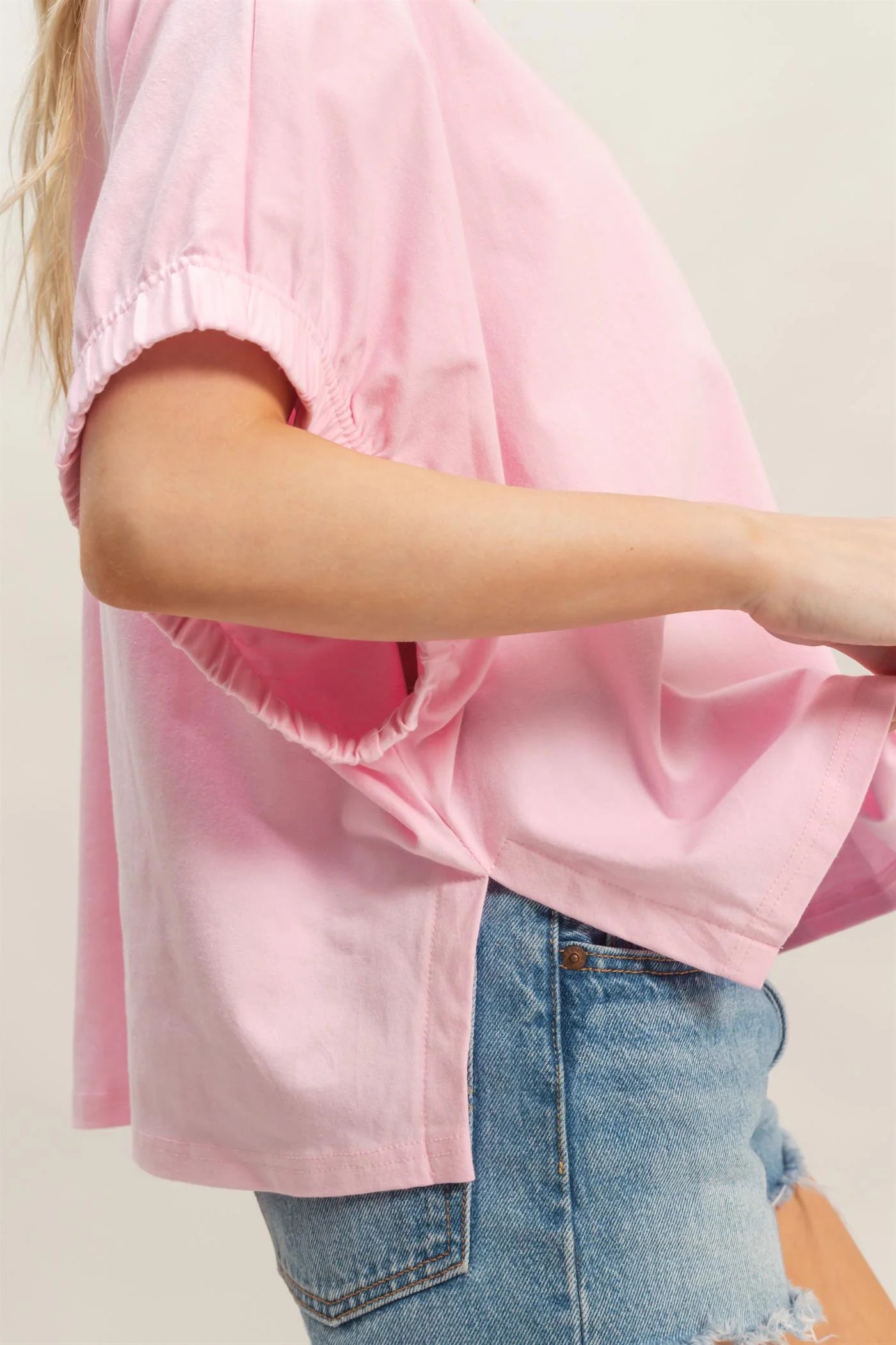 Light Pink Oversized Elastic Cuff Top with gathered sleeves, relaxed fit; available in sizes XS-XL.