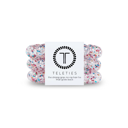 TELETIES Hair Ties feature colorful confetti patterns. Sizes available: Small and Large.