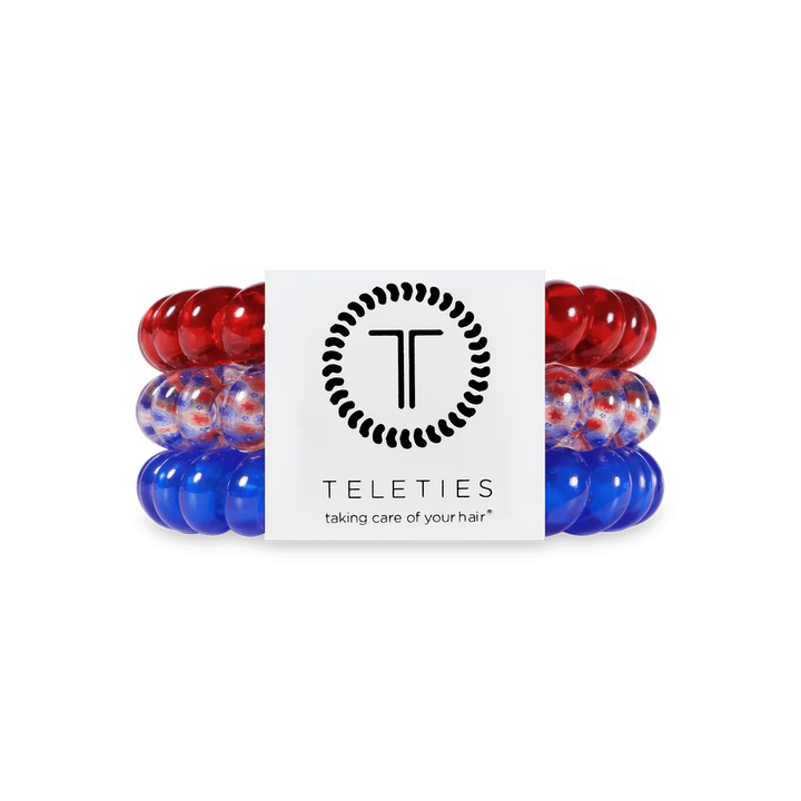 Set of three TELETIES Hair Ties in red, blue, and red-white-blue mix. Includes small and large sizes.
