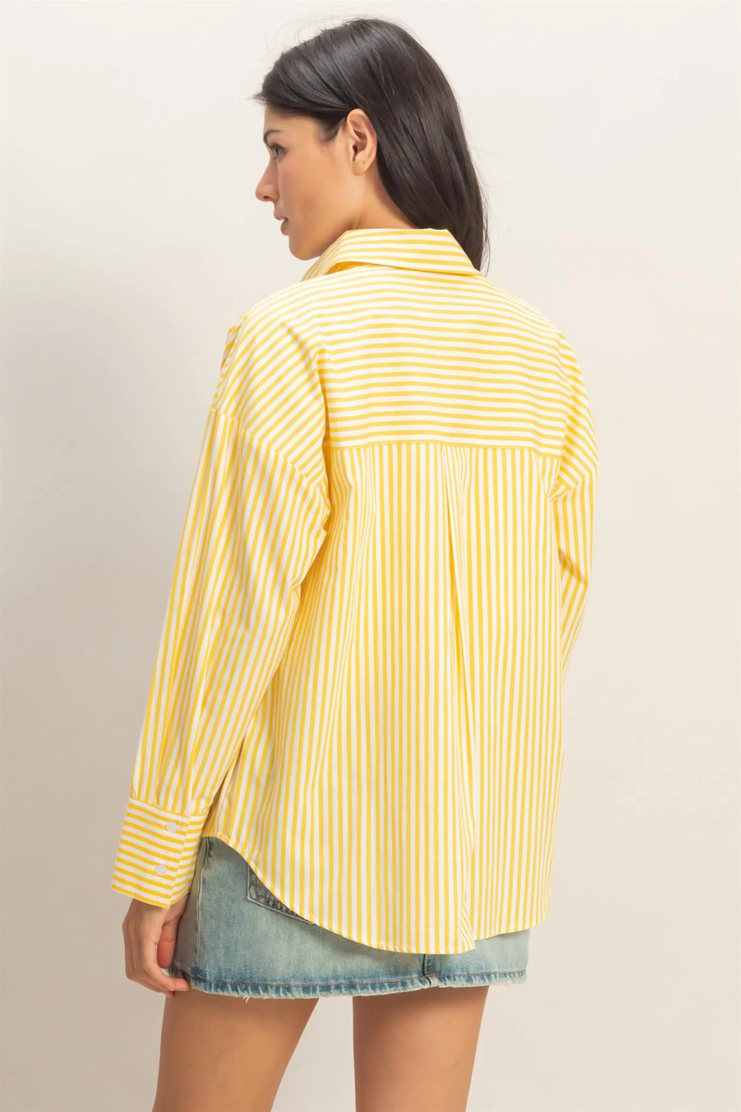 Striped Button-Up Poplin Shirt in yellow and white vertical stripes. Available in sizes XS-XL.
