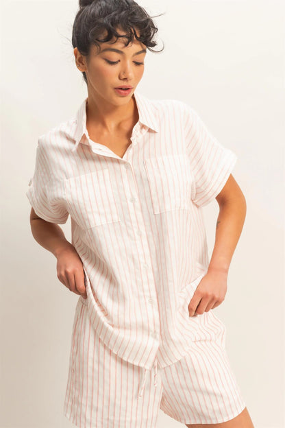 Striped Button-Up Dolman Sleeve Shirt in light pink and white. Available in sizes XS-XL.