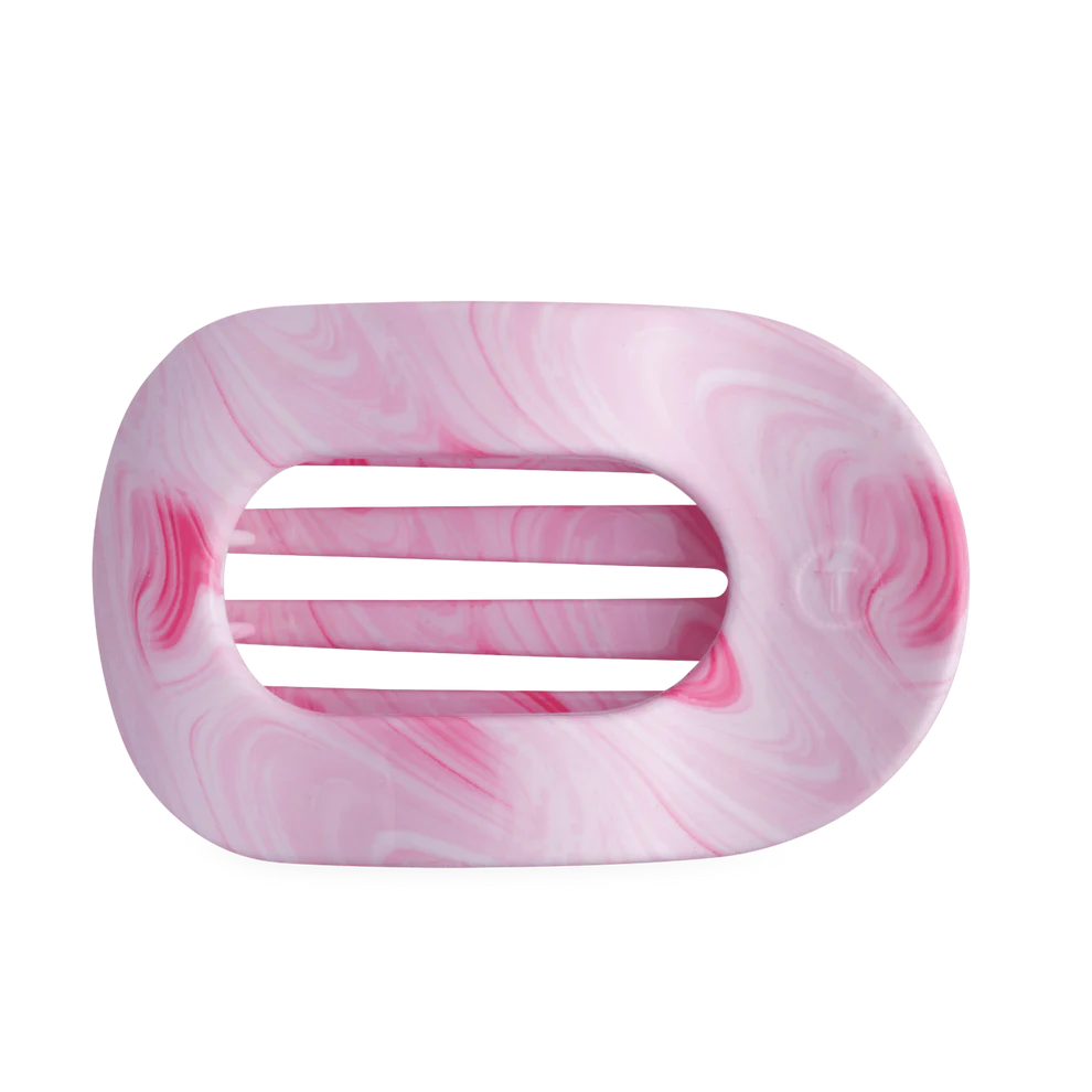 Rectangular soap dish with rounded edges, pink and white marbled, three center slats. Available in small and large sizes.