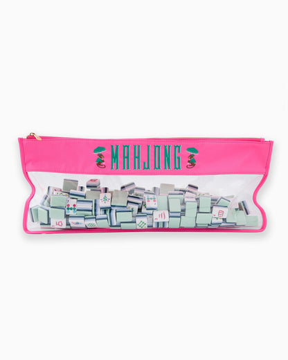 Bright pink mahjong bag with green “MAHJONG” embroidery, two monkeys, zippered closure. Includes full tile set. Sizes: standard.