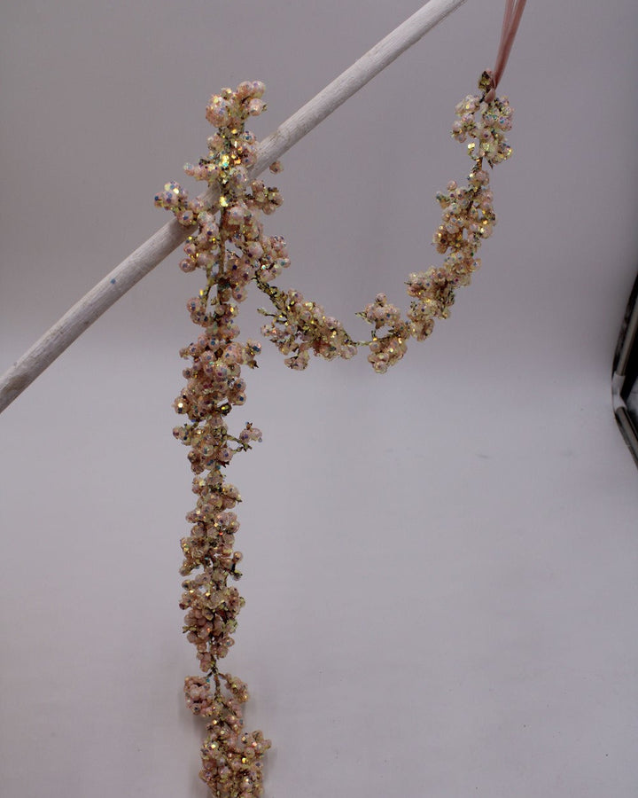 47″ pink shimmer glitter garland with iridescent beads.