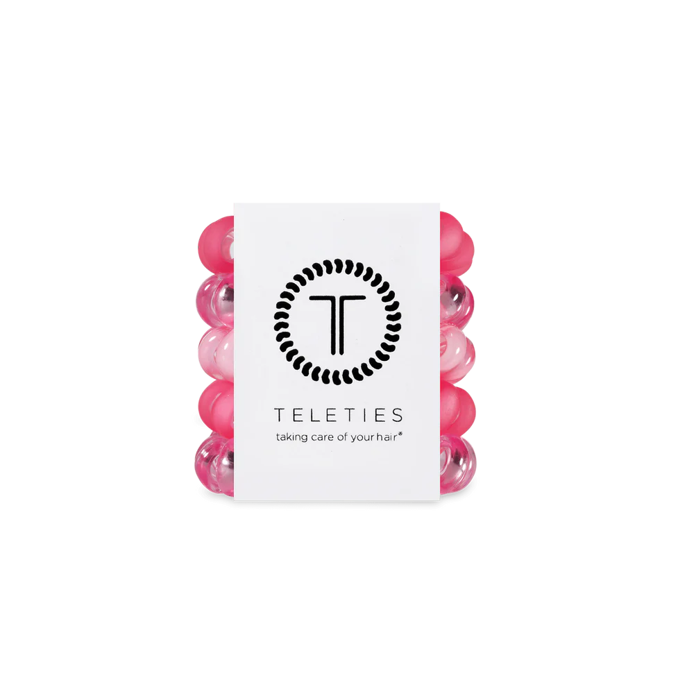 Set of five pink and clear TELETIES hair ties with branded card; available in small, medium, and large sizes.