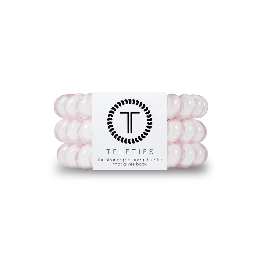 TELETIES Pink Spiral Hair Accessories: Strong grip, no-rip hair ties in pink. Sizes available: Small, Large.