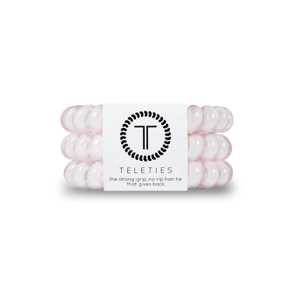 TELETIES Pink Spiral Hair Accessories: Strong grip, no-rip hair ties in pink. Sizes available: Small, Large.