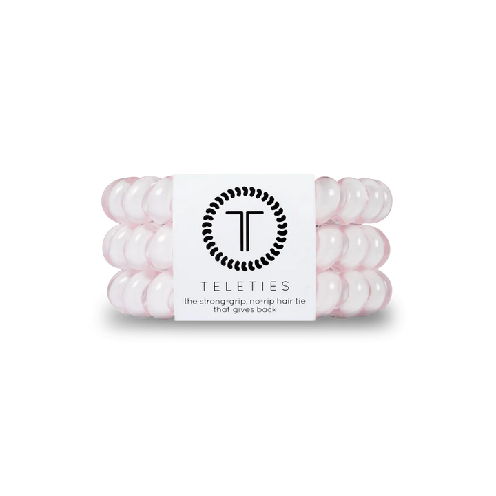 TELETIES Pink Spiral Hair Accessories: Strong grip, no-rip hair ties in pink. Sizes available: Small, Large.