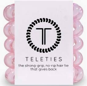 Pack of TELETIES Hair Ties, strong-grip, no-rip design, logo and slogan shown. Available in small, medium, and large sizes.