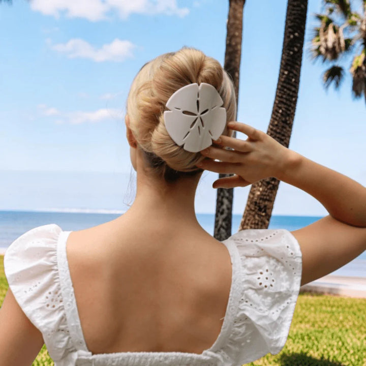 Sand Dollar Flat Hair Clip in use; available in S, M, L. Simple, flat design ideal for various hair types and styles.