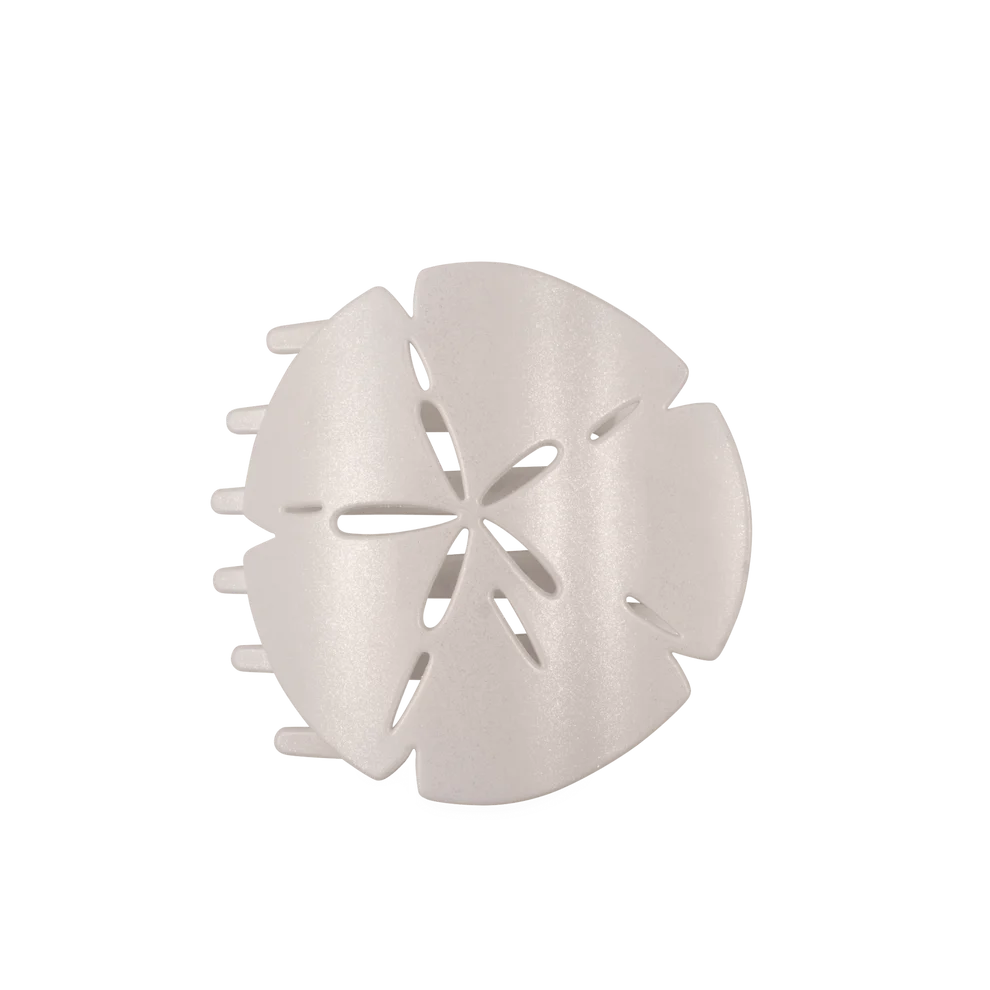 White plastic Sand Dollar Flat Hair Clip with flower-inspired cutout design; available in small, medium, and large sizes.