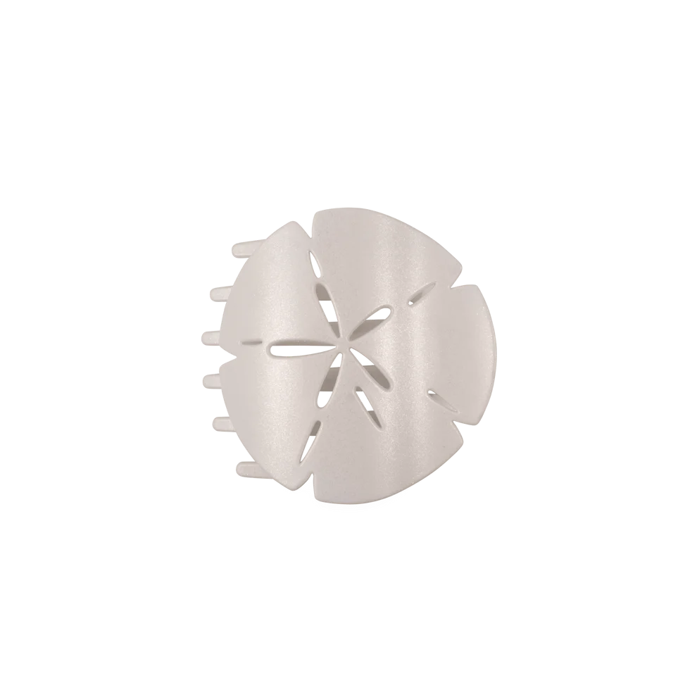 White, semi-circular Sand Dollar Flat Hair Clip with matte finish and petal cutouts. Available in small and large sizes.