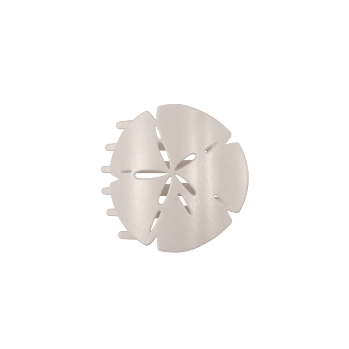 White, semi-circular Sand Dollar Flat Hair Clip with matte finish and petal cutouts. Available in small and large sizes.