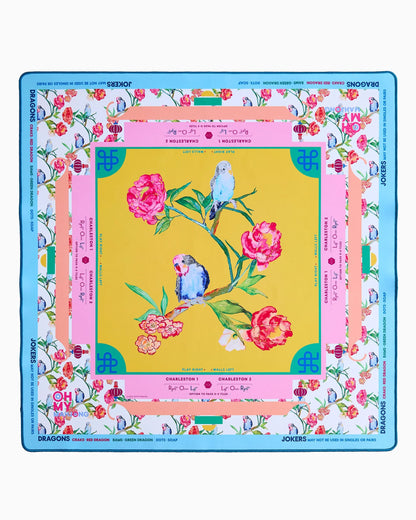 Spring Fling x Brooke Wright Mat with two blue birds on flowering branch and bright floral patterns. Available in multiple sizes.