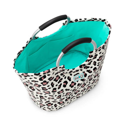 Luxy Leopard Loopi Tote Bag by Swig Life:
- Leopard print exterior
- Turquoise interior
- Two black and silver handles
- Interior pocket
- Ideal as a pool bag
- "SWIG" logo on exterior

Sizes available: One size