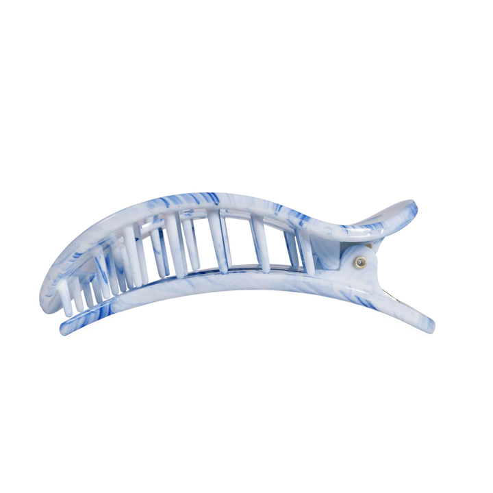 Blue and white marbled plastic hair clip with curved shape and interlocking teeth. Available in small, medium, and large sizes.