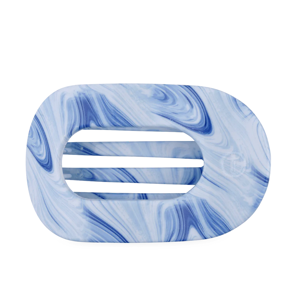 Blue and white tie-dye oval hair clip with 3 horizontal slots; available in small, medium, and large sizes.