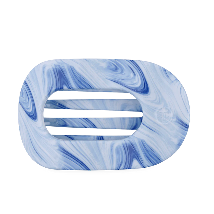 Blue and white tie-dye oval hair clip with 3 horizontal slots; available in small, medium, and large sizes.