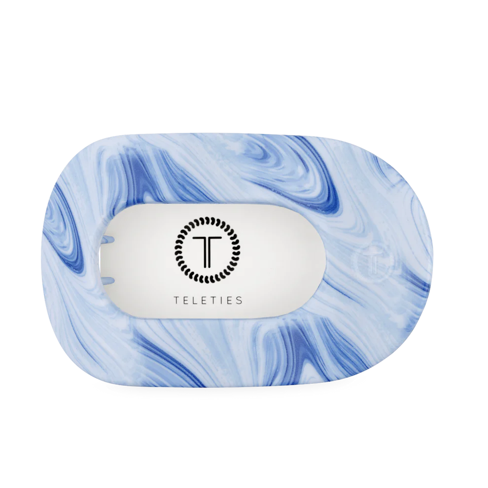 Flat Round Hair Clip in blue and white tie-dye, rectangular shape, TELETIES logo on white center. Available in multiple sizes.